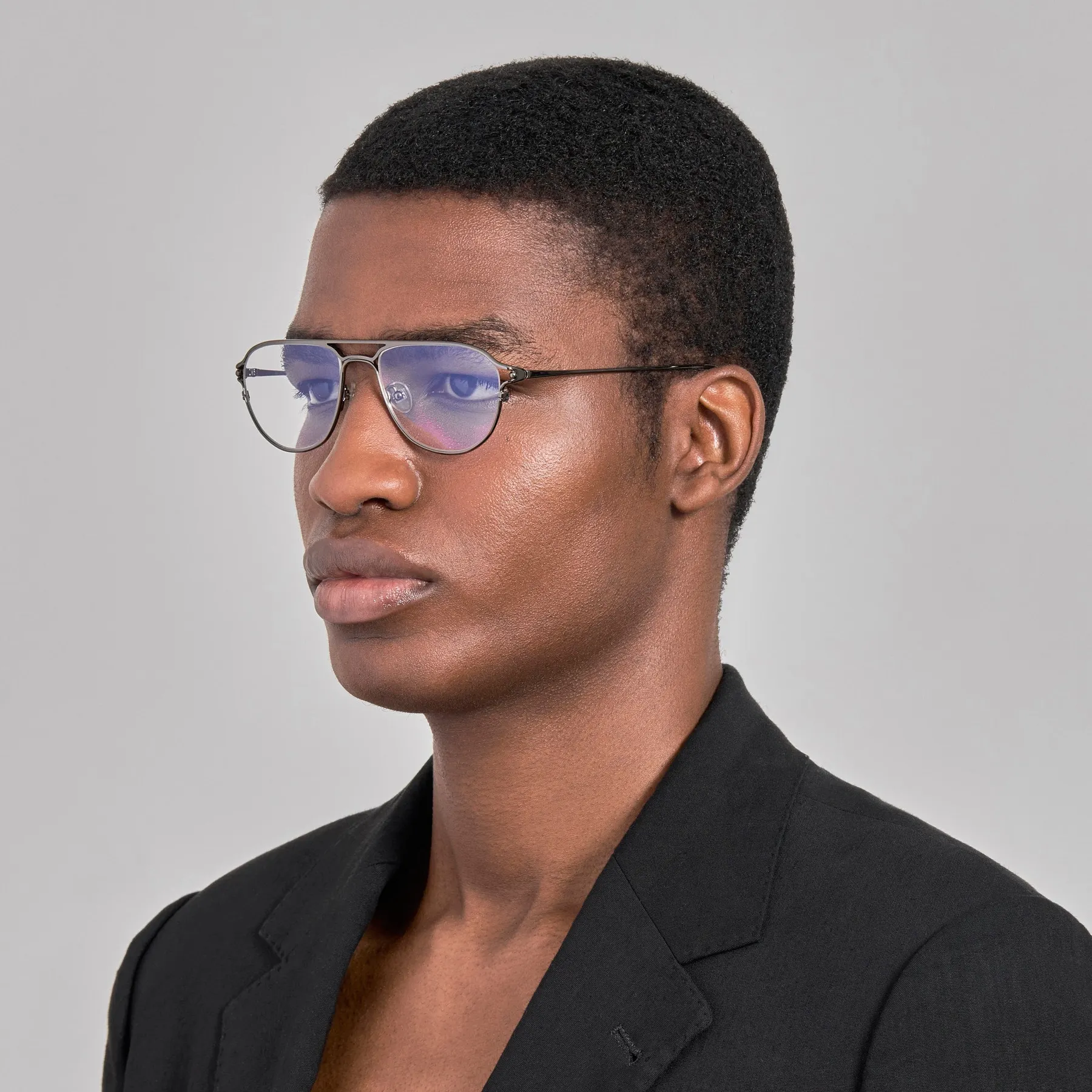 Model wearing Jacquemus Acapulco optical glasses in Silver