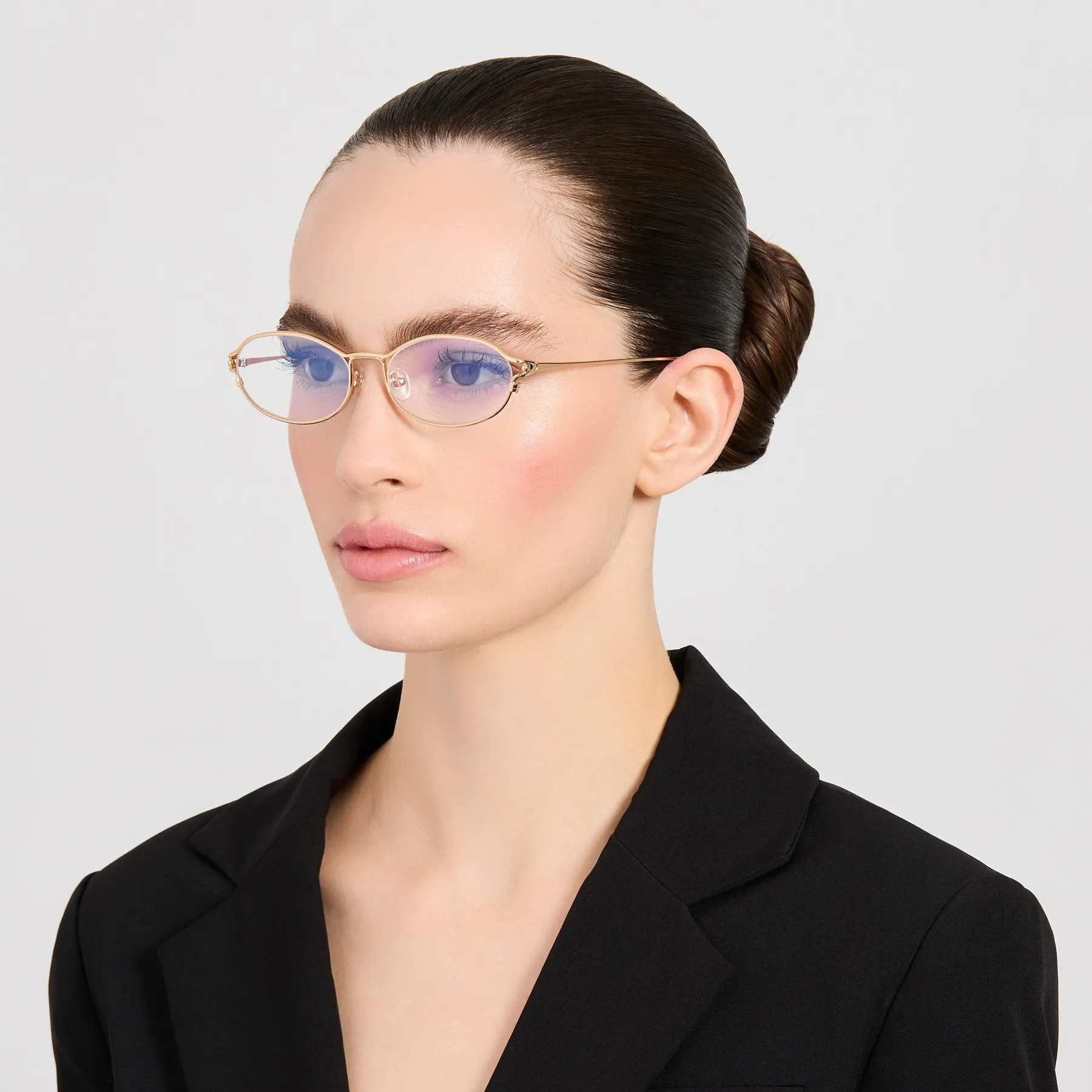 Model wearing Jacquemus Tempo optical glasses in Gold
