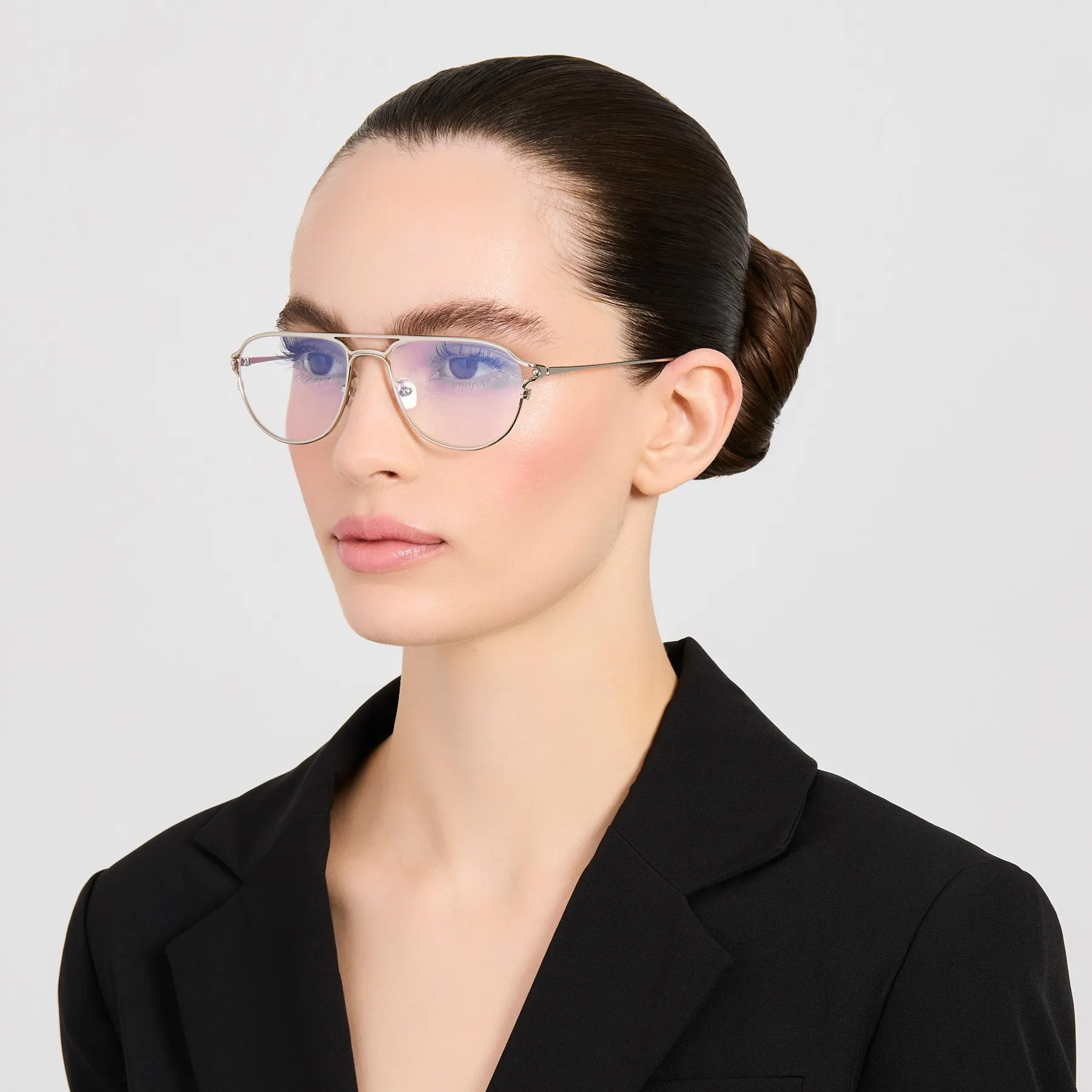 Model wearing Jacquemus Acapulco optical glasses in Silver