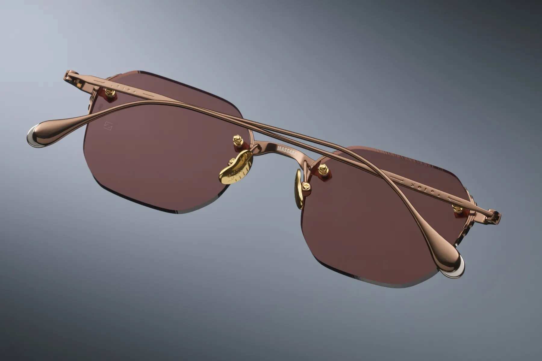 Massada Pentagon Paramount in Brushed Rose Gold, campaign shot with crossed temples